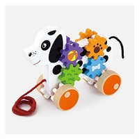 Wooden pulling dog with toothed wheels Viga